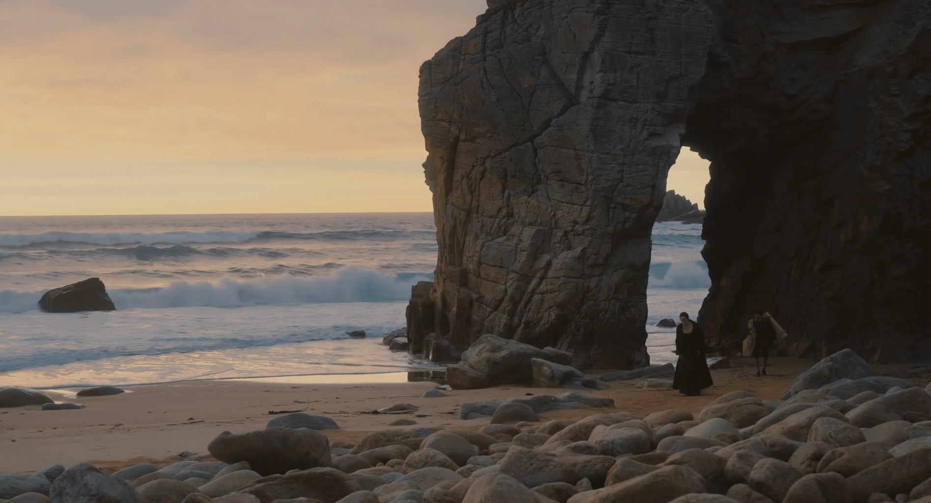Marianne (Noémie Merlant) arrives by boat on La Grande Plage in Saint-Pierre-Quiberon in Brittany, France, for her secret mission in "Portrait of a Lady on Fire."